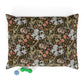 Decorative pillow with floral and ghost pattern on a white background