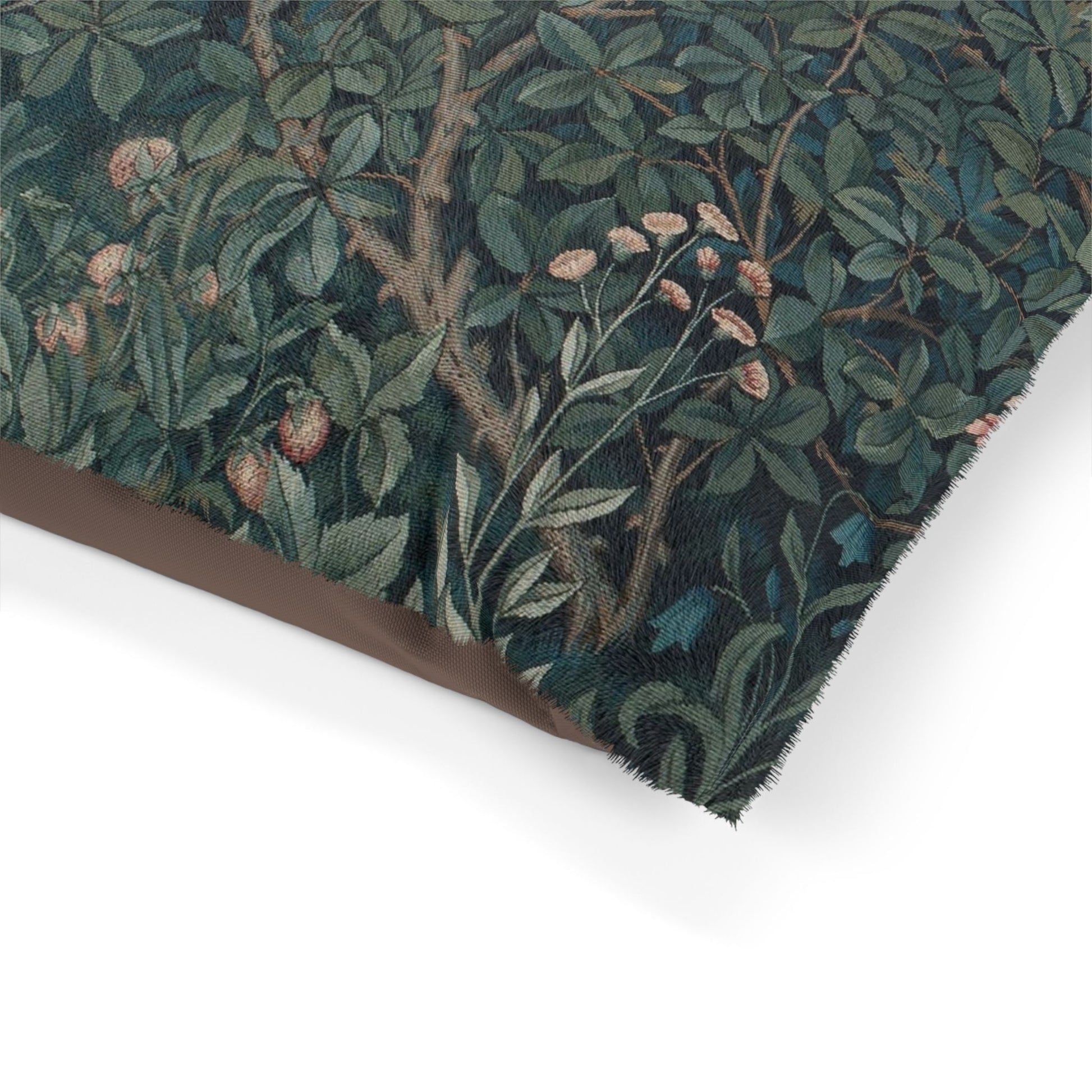 Close-up of a green floral patterned fabric with brown border on a white background