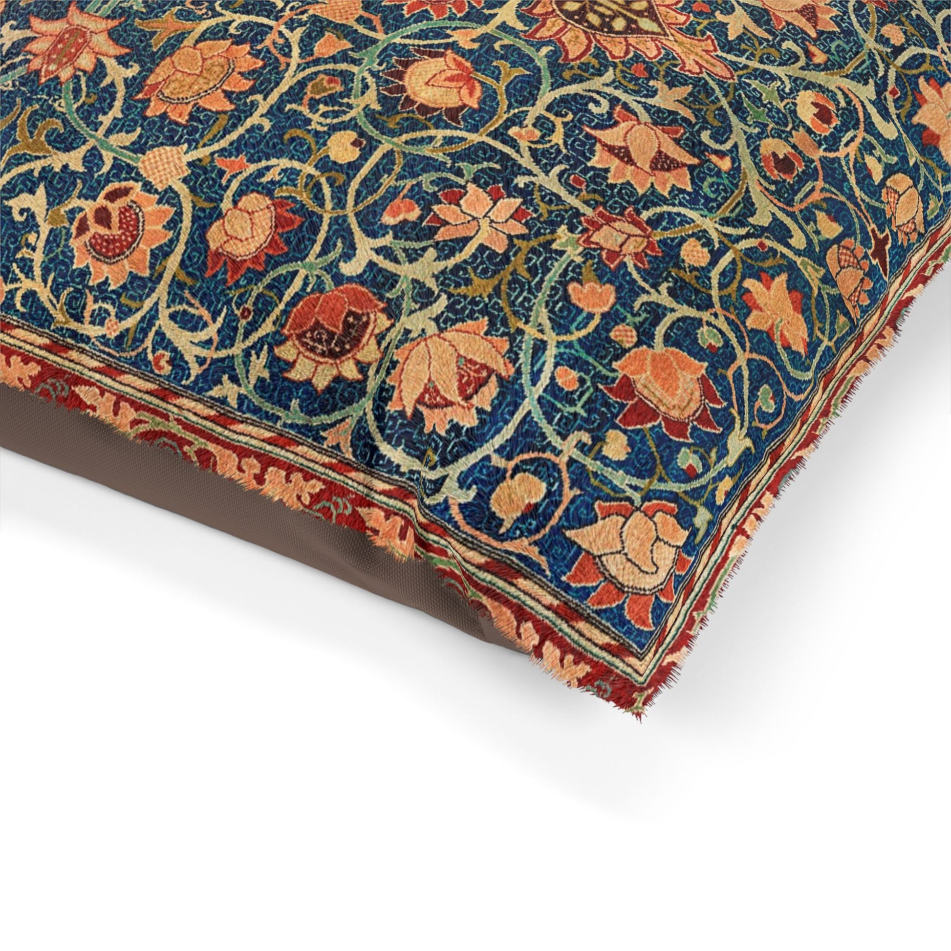 Close-up of a floral patterned fabric with vibrant colors on a white background