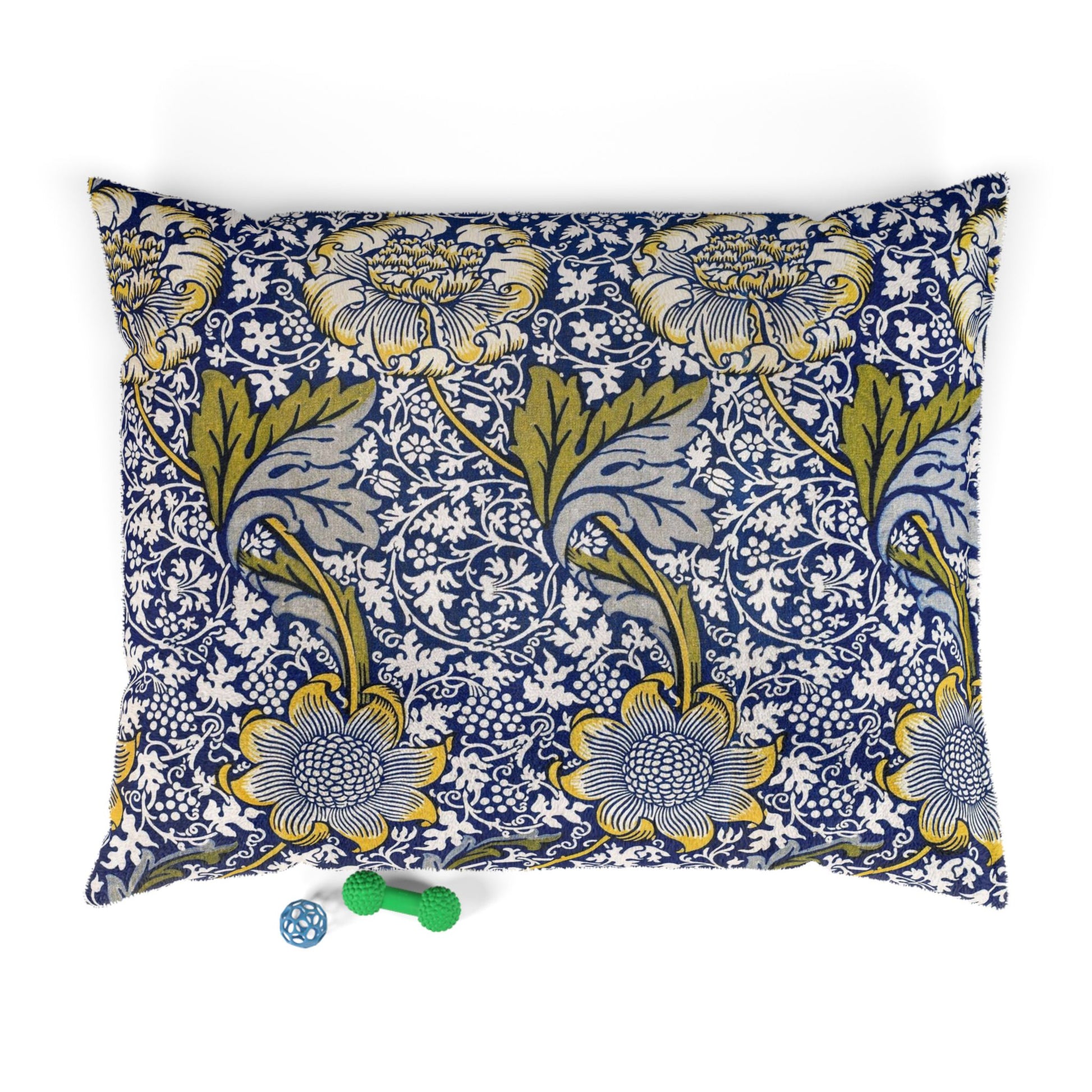 Floral patterned dog pillow on a white background