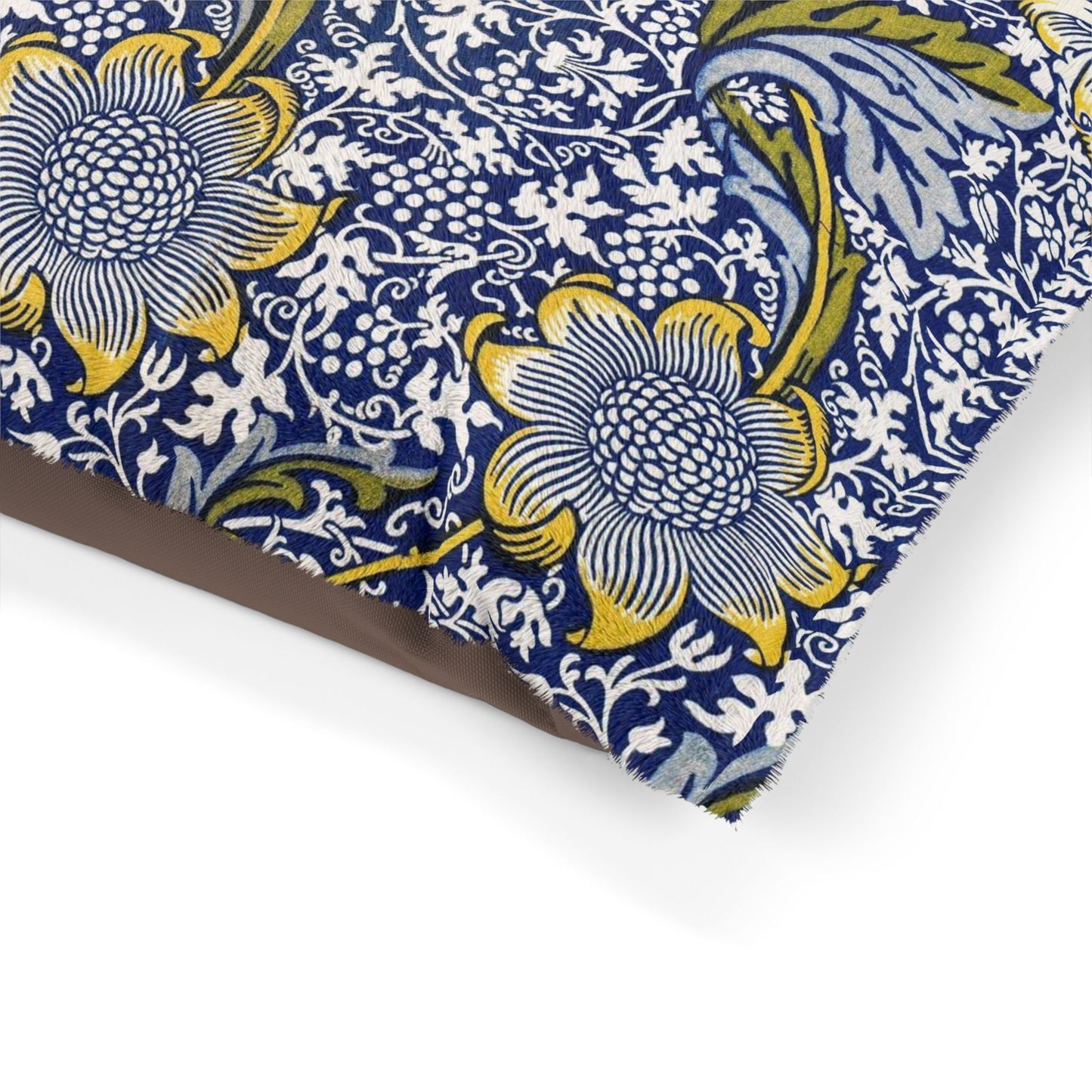 Fabric with blue and yellow floral pattern on a white background
