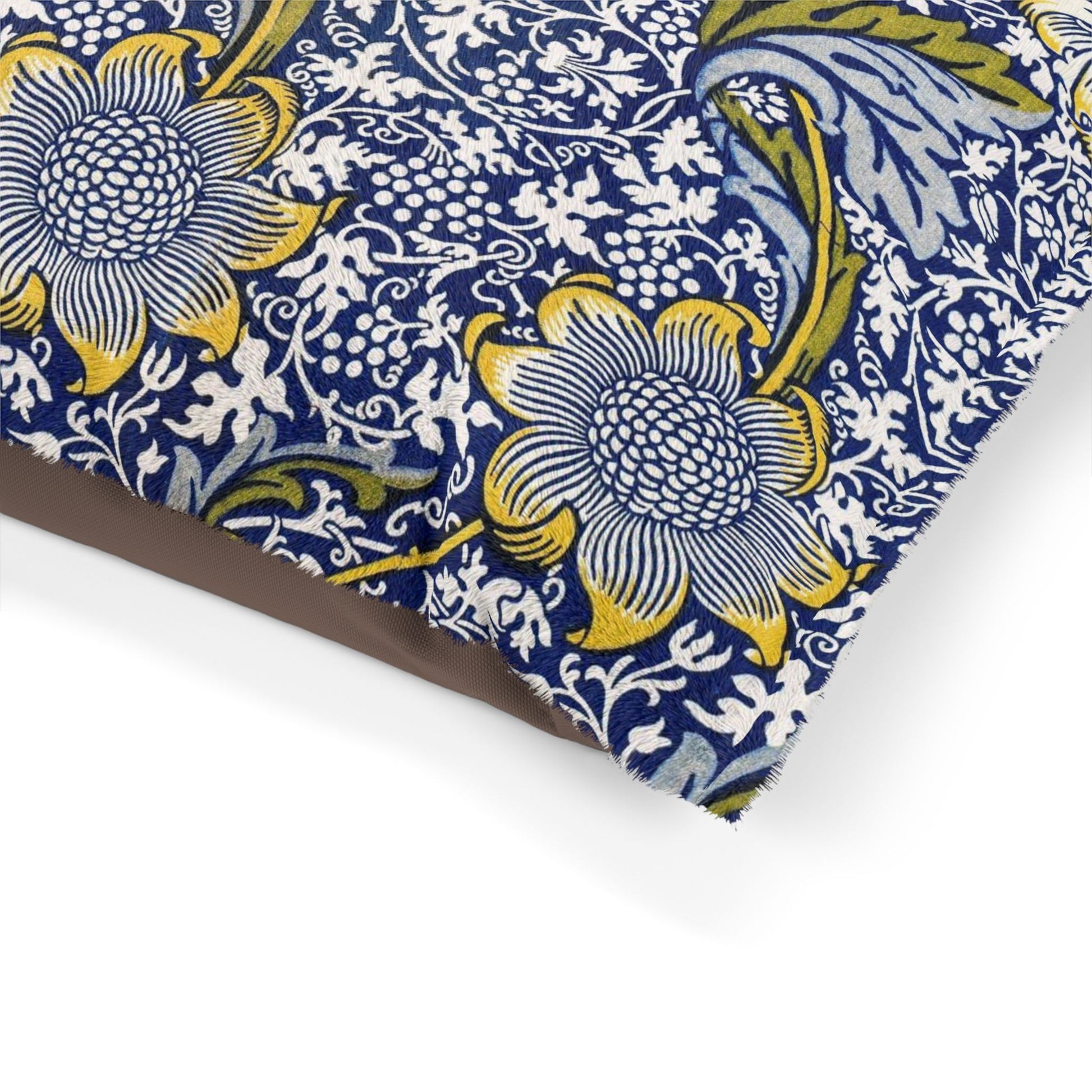 Fabric with blue and yellow floral pattern on a white background