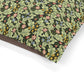 Floral and leaf patterned fabric on a white background