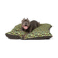 Dog lying on a floral-patterned dog bed with a white background