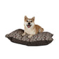 Dog lying on a floral-patterned dog bed with a white background