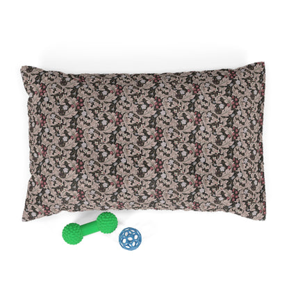 Floral-patterned pet bed with a green bone-shaped toy and a blue ball on a white background