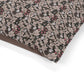 Floral patterned fabric with a brown border on a white background