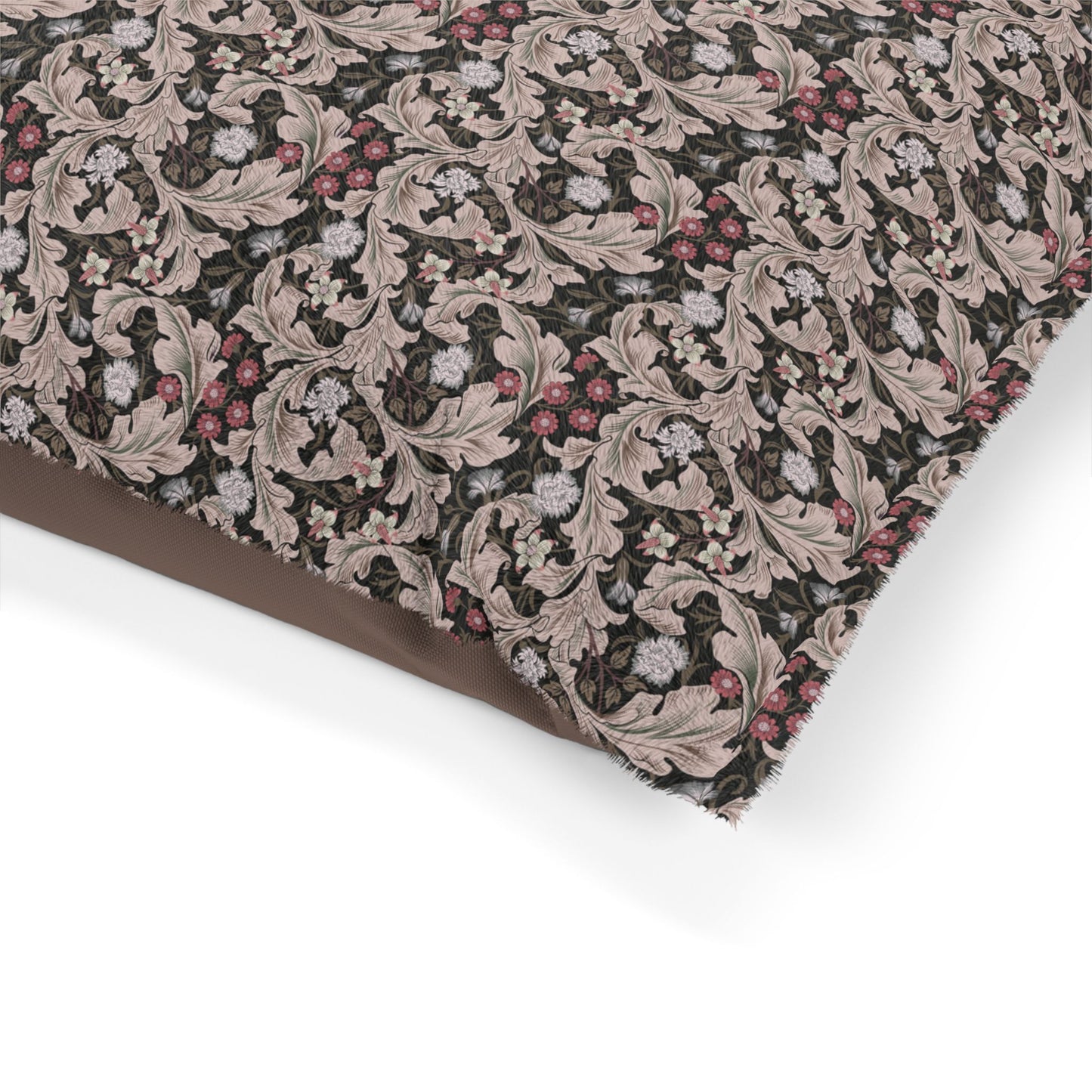 Floral patterned fabric with a brown border on a white background