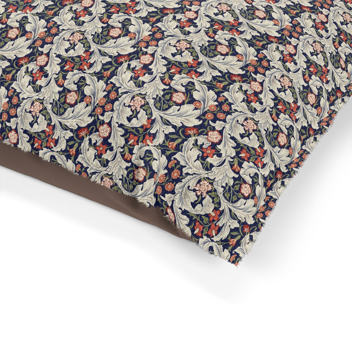 Floral and leaf patterned fabric on a white background