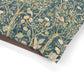 Dog Pillow with a nature-themed design featuring William Morris & Co birds and flowers on a teal background.