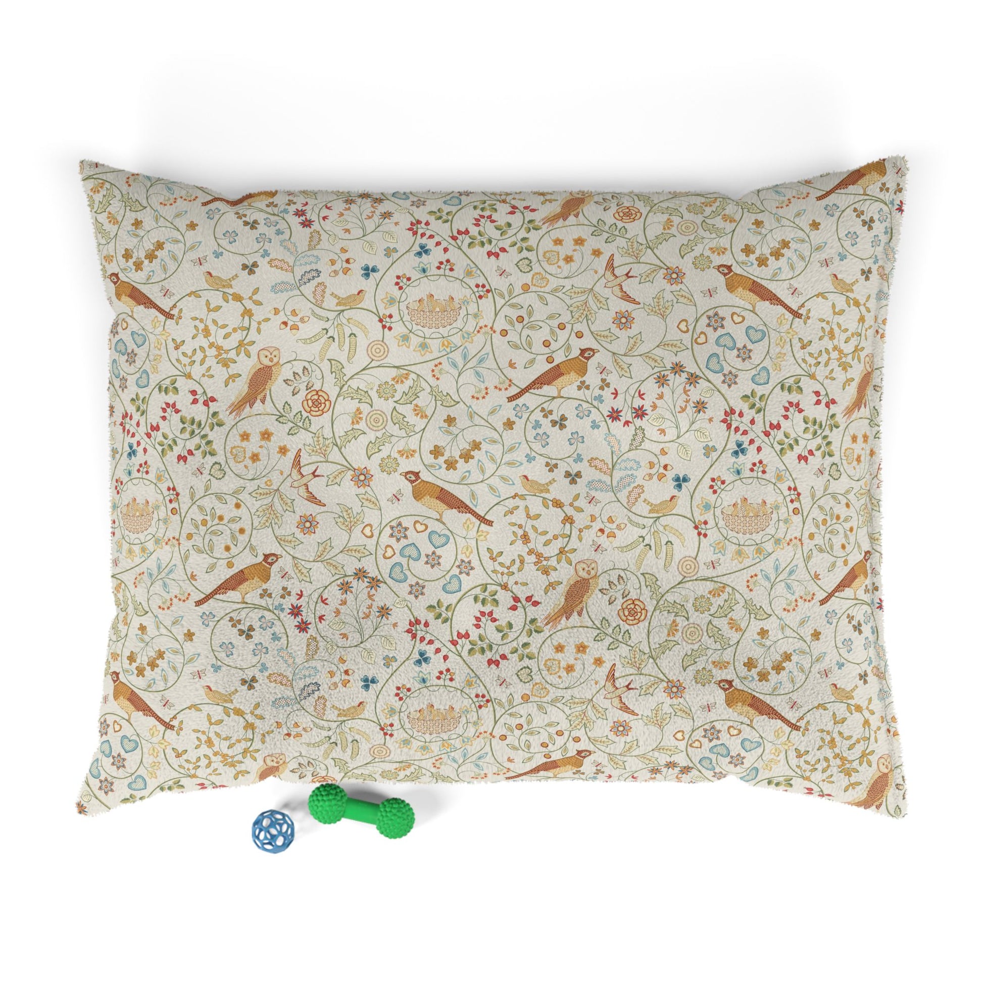 Decorative dog bed pillow with bird and floral pattern on a white background