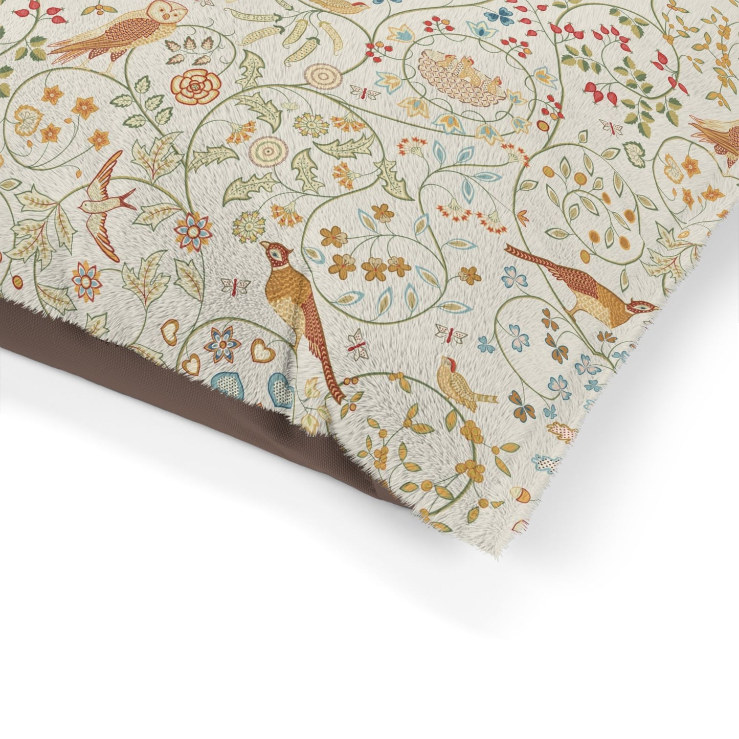 Floral and bird patterned paper with a brown border on a white background