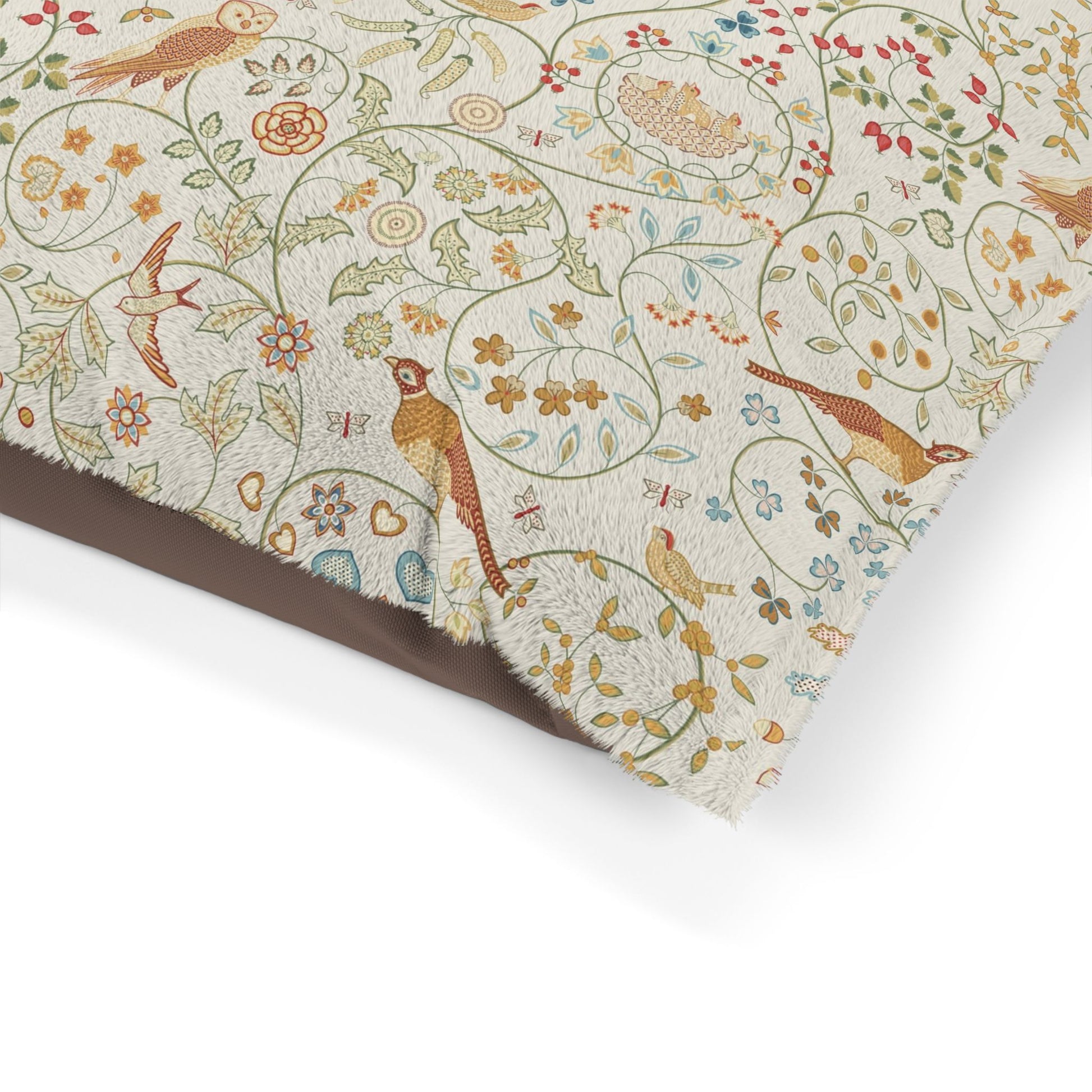 Floral and bird patterned paper with a brown border on a white background