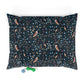 Decorative pillow with bird and floral pattern on a white background