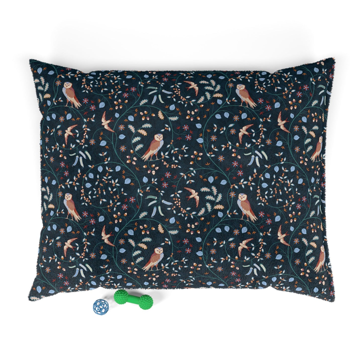 Decorative pillow with bird and floral pattern on a white background