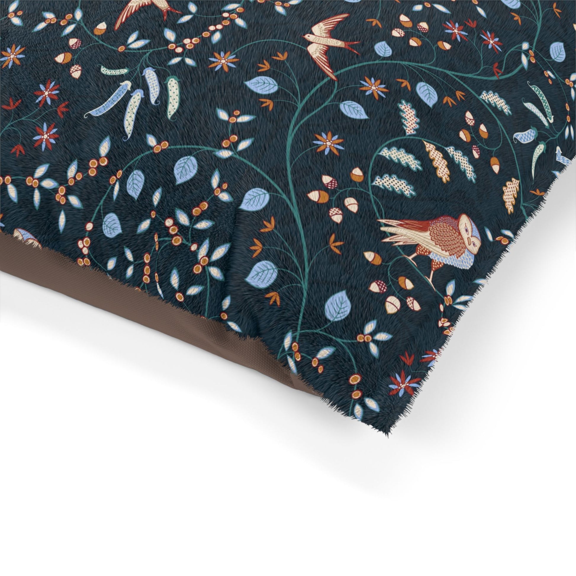 Decorative fabric with floral and bird pattern on a white background