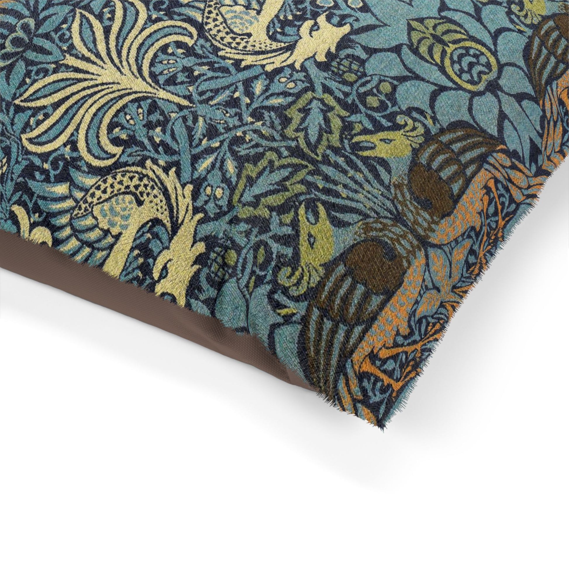 Close-up of a patterned fabric with birds and foliage on a white background