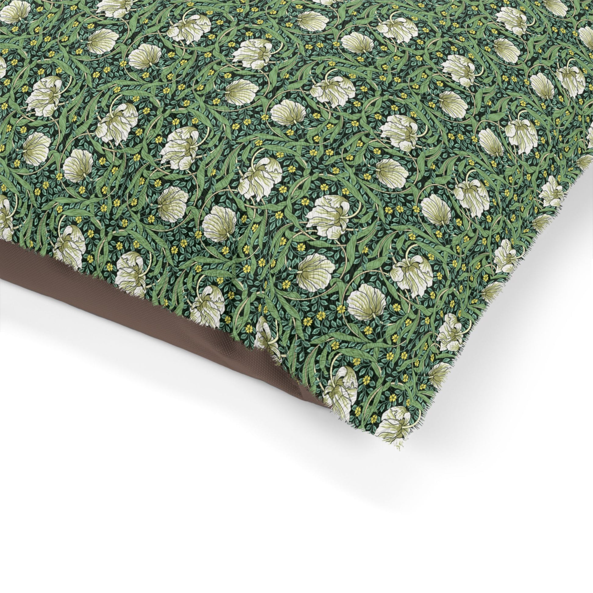 Floral patterned fabric with white flowers on a green background