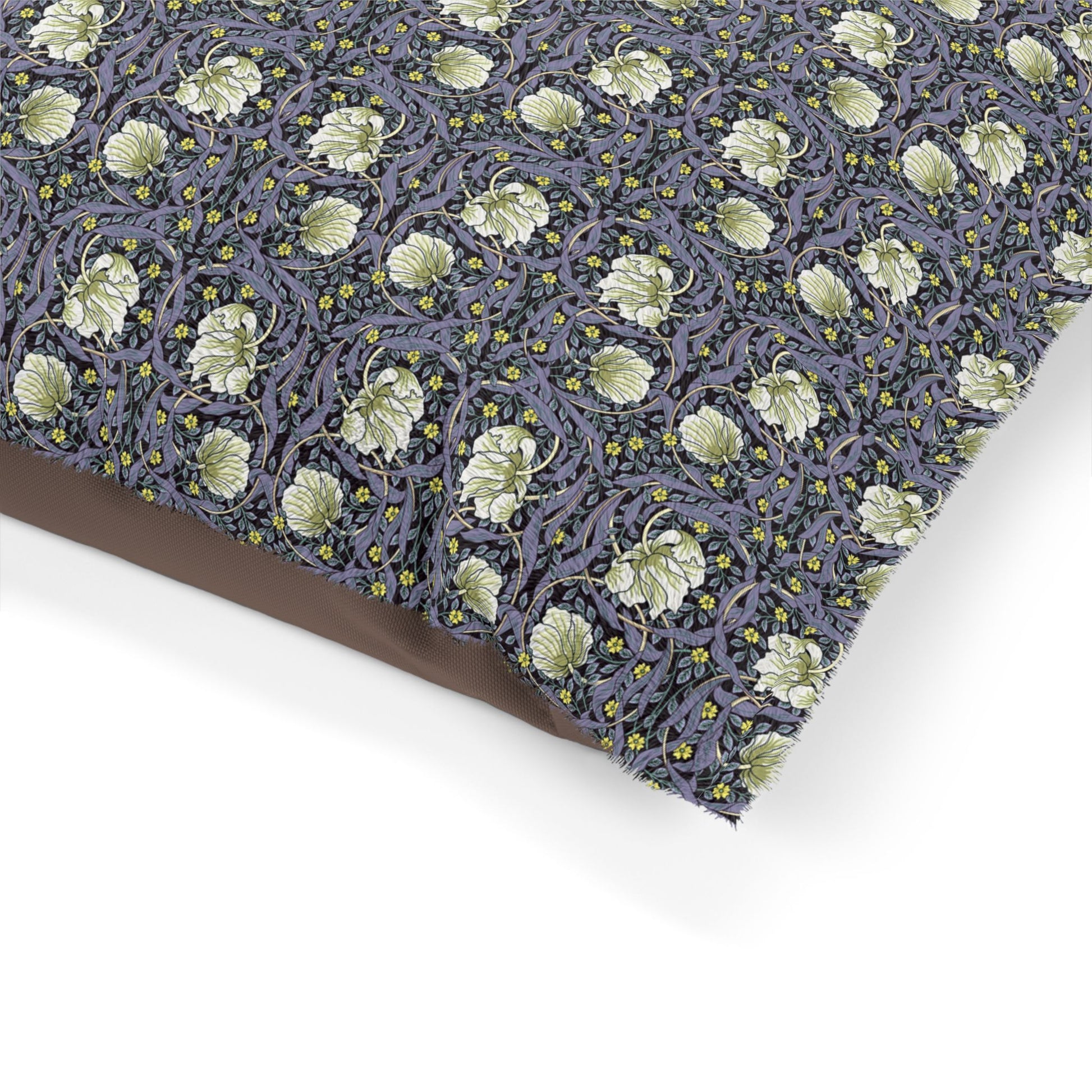 Floral patterned fabric with green leaves on a purple background