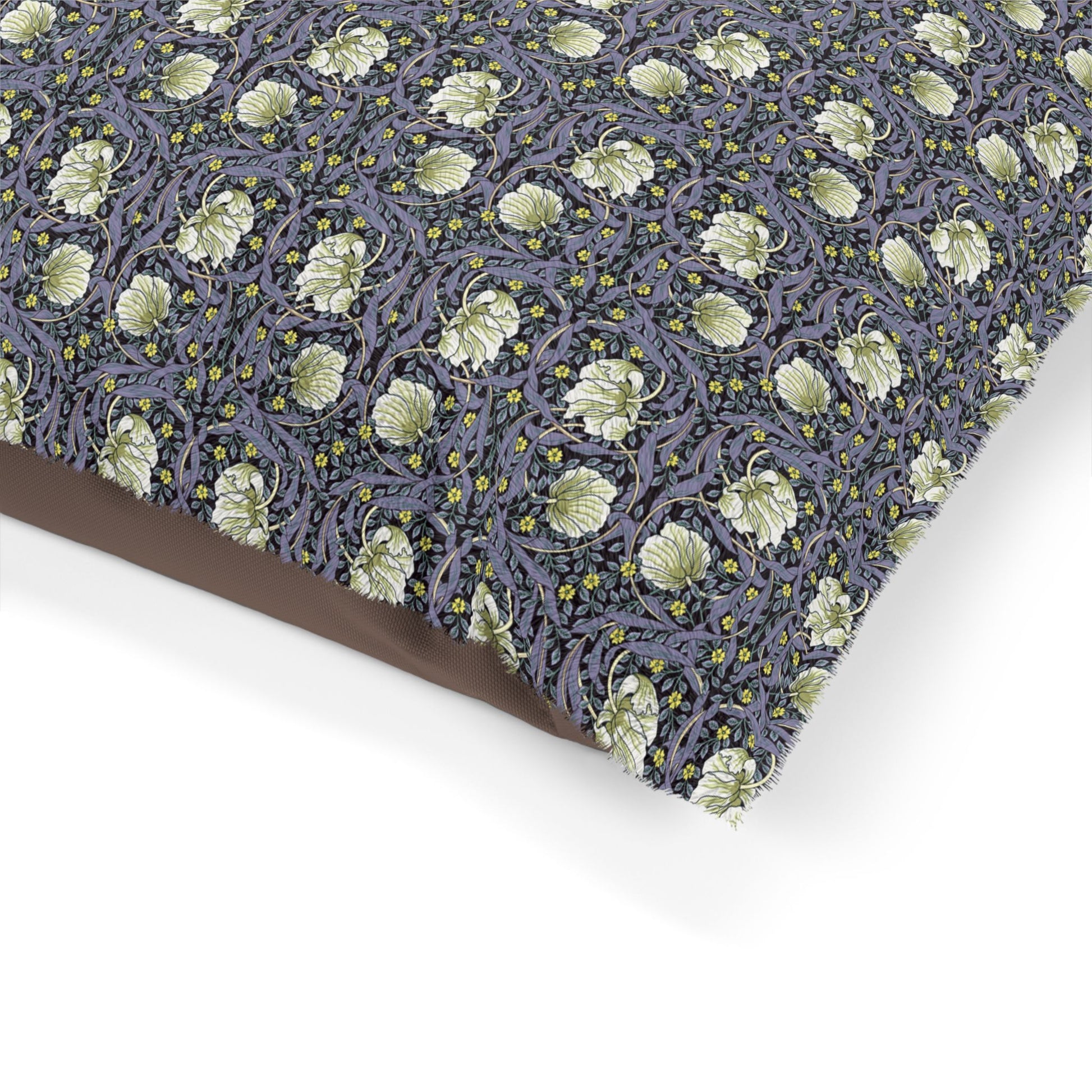 Floral patterned fabric with green flowers on a purple background