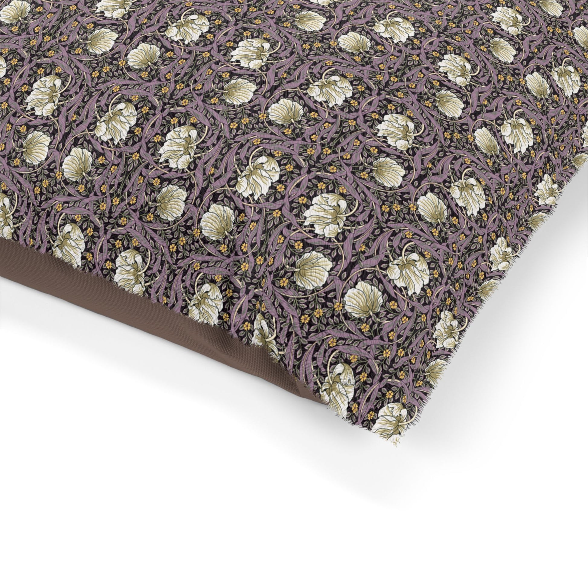 Floral patterned fabric with a brown border on a white background