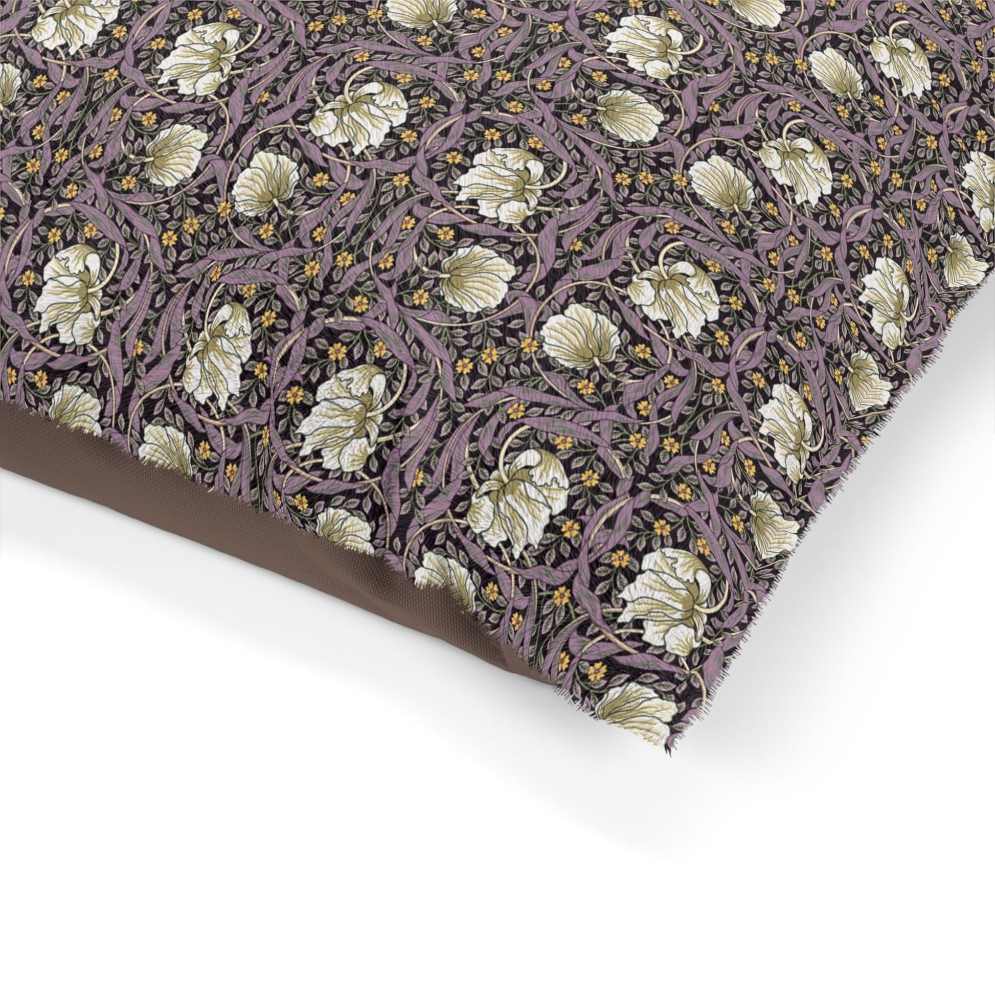Floral patterned fabric with a brown border on a white background