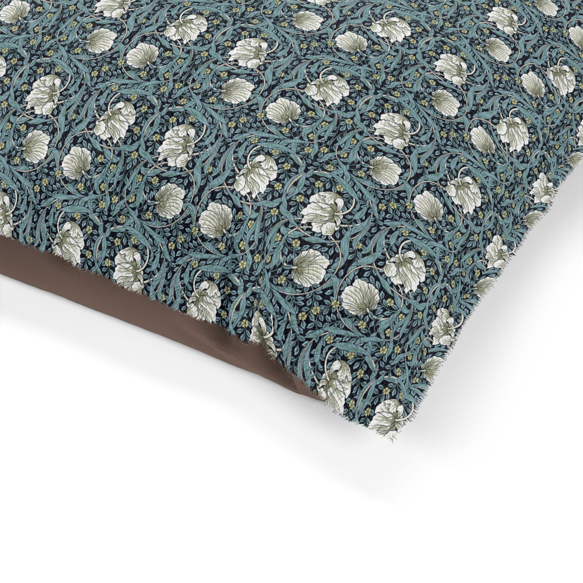 Floral patterned fabric with a brown border on a white background