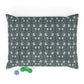 Decorative pillow with blue and white pattern on a white background