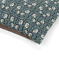 Floral patterned fabric with a brown border on a white background