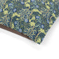 Floral patterned fabric with blue and green colors on a white background