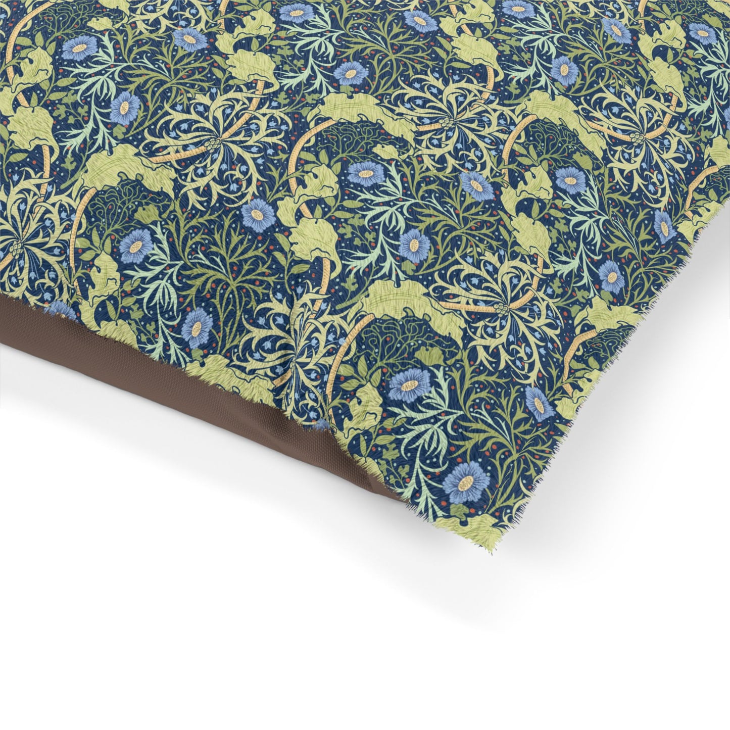 Floral patterned fabric with blue flowers and green leaves on a white background