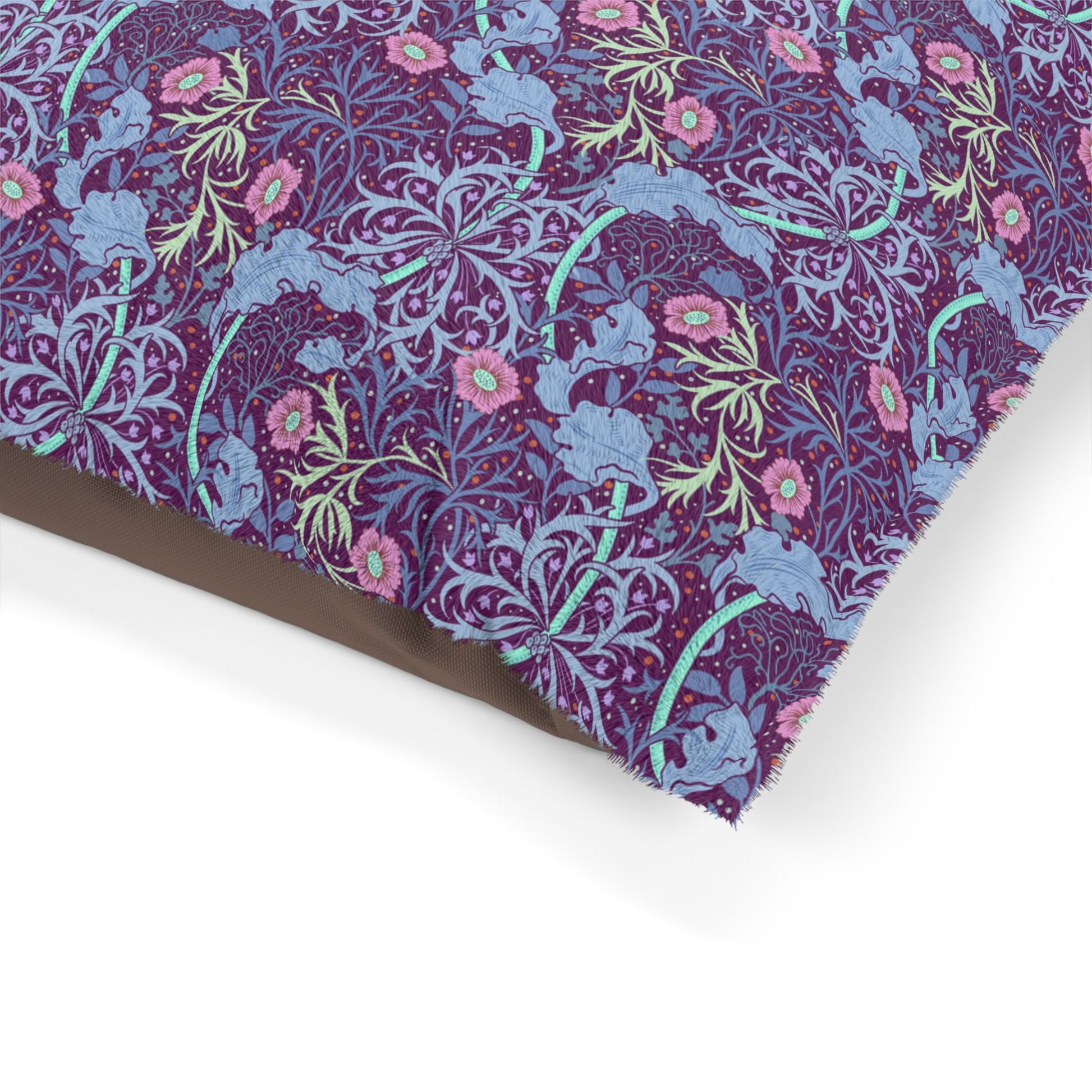 Floral patterned fabric with purple, blue, and pink colors on a white background