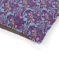 Fabric with a floral and deer pattern on a white background