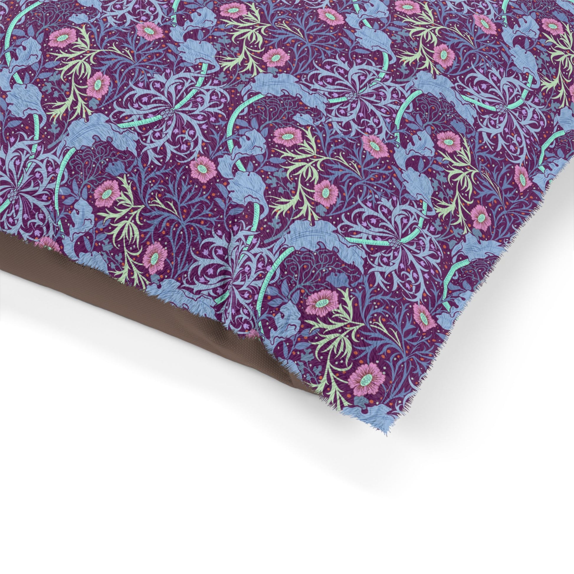 Fabric with a floral and deer pattern on a white background