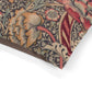 Close-up of a fabric with intricate floral and geometric pattern on a white background