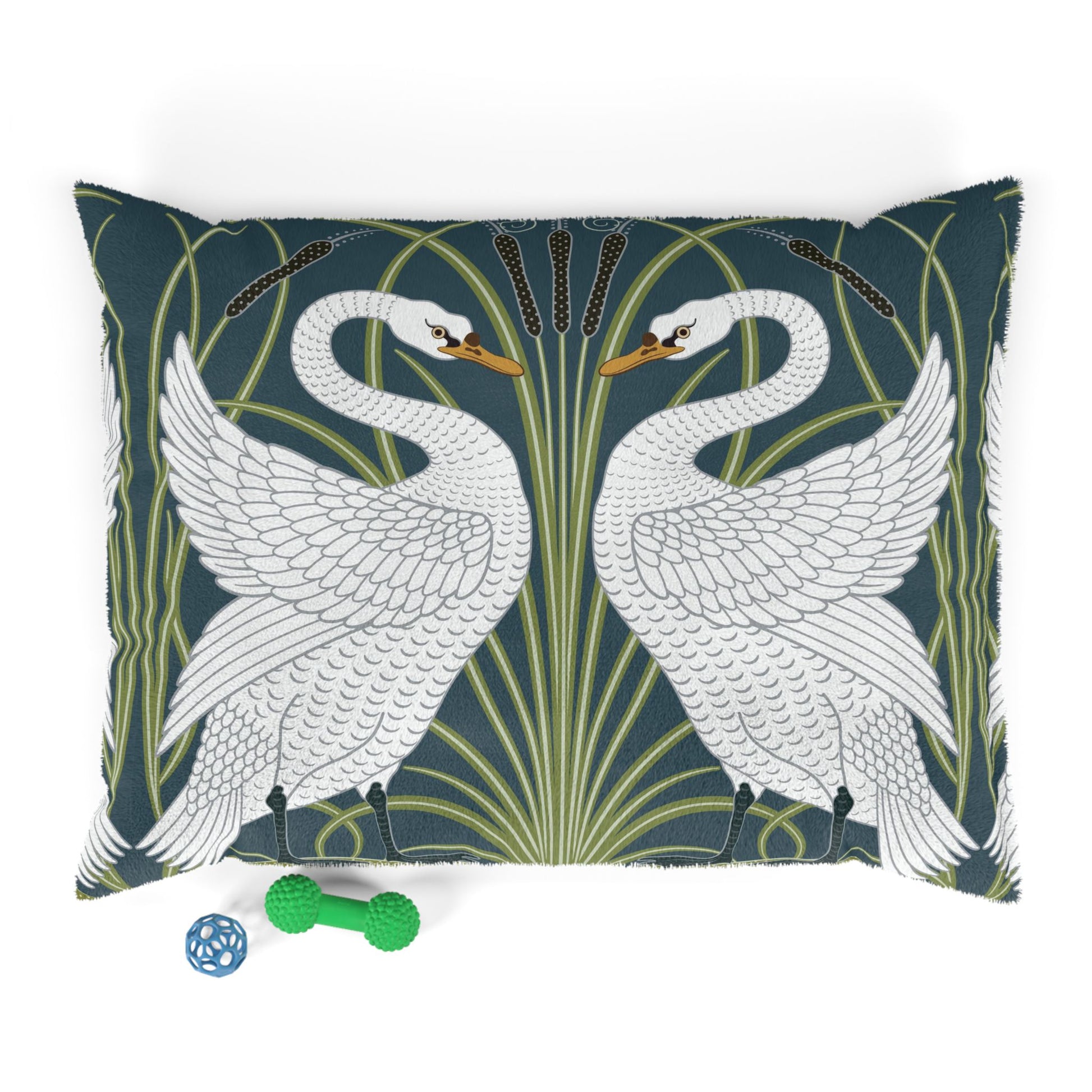 Decorative pillow with swan design on a dark green background