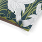 Close-up of a fabric with white bird design on a dark blue background