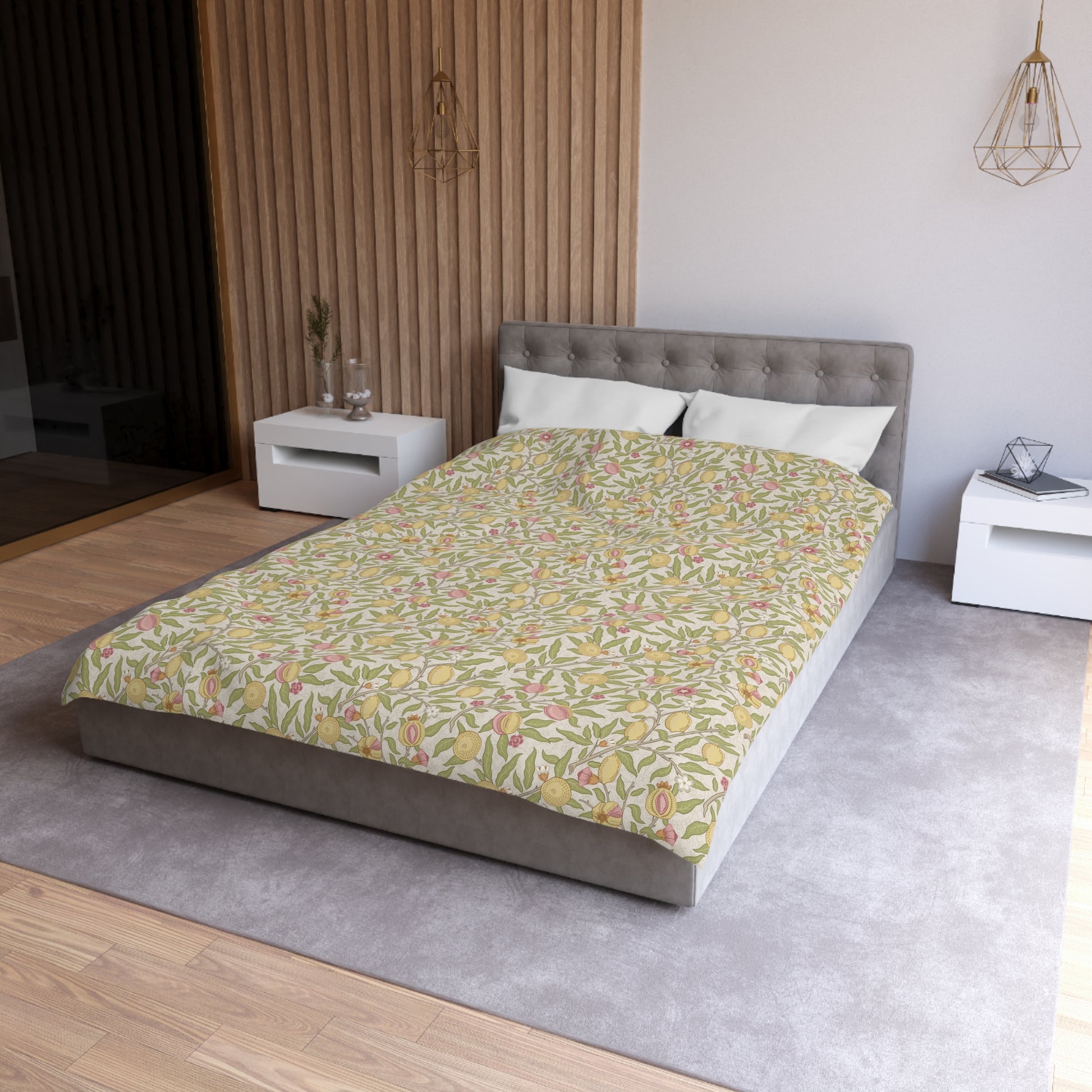 Bed with floral patterned bedspread in a modern bedroom setting