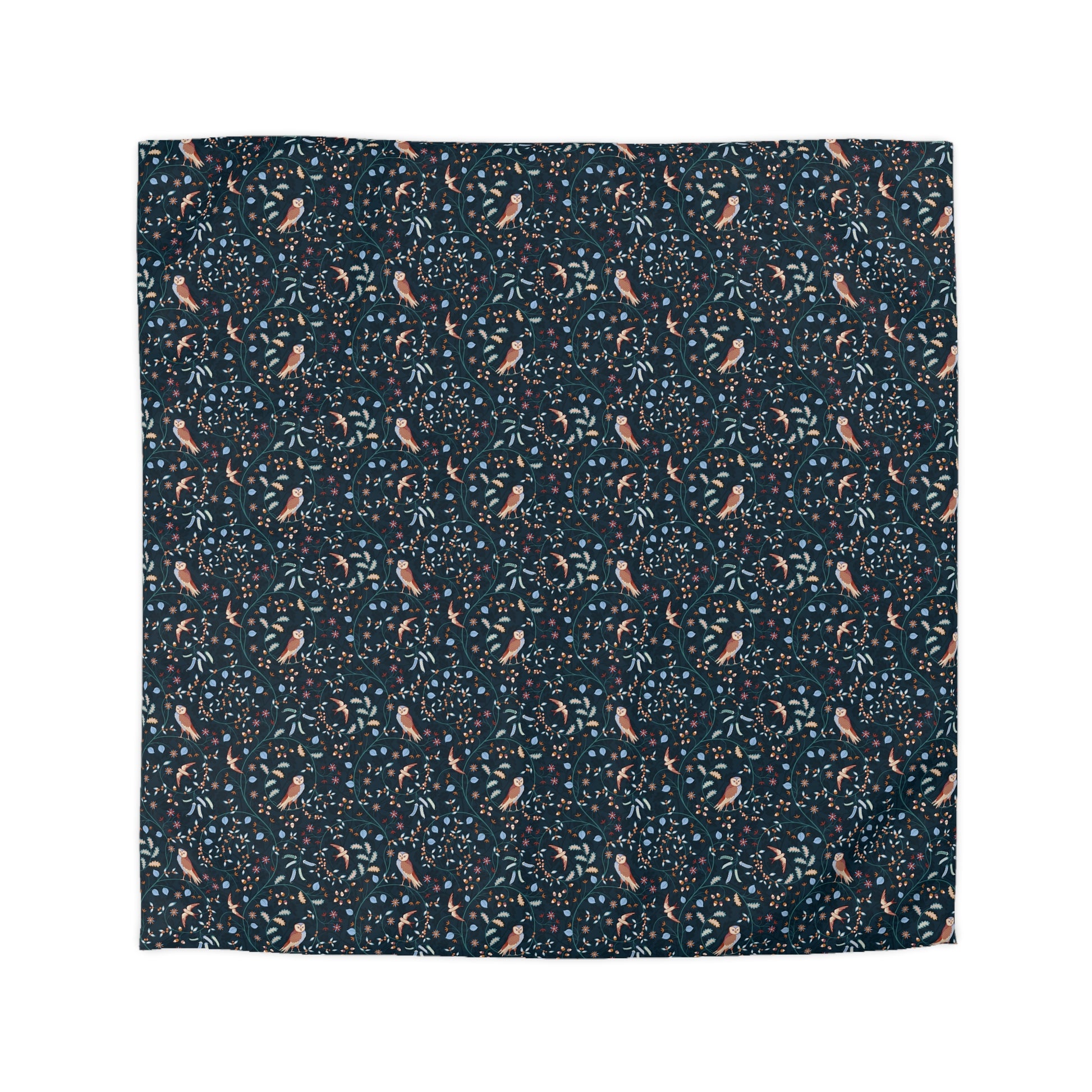 Patterned fabric with small designs on a dark blue background