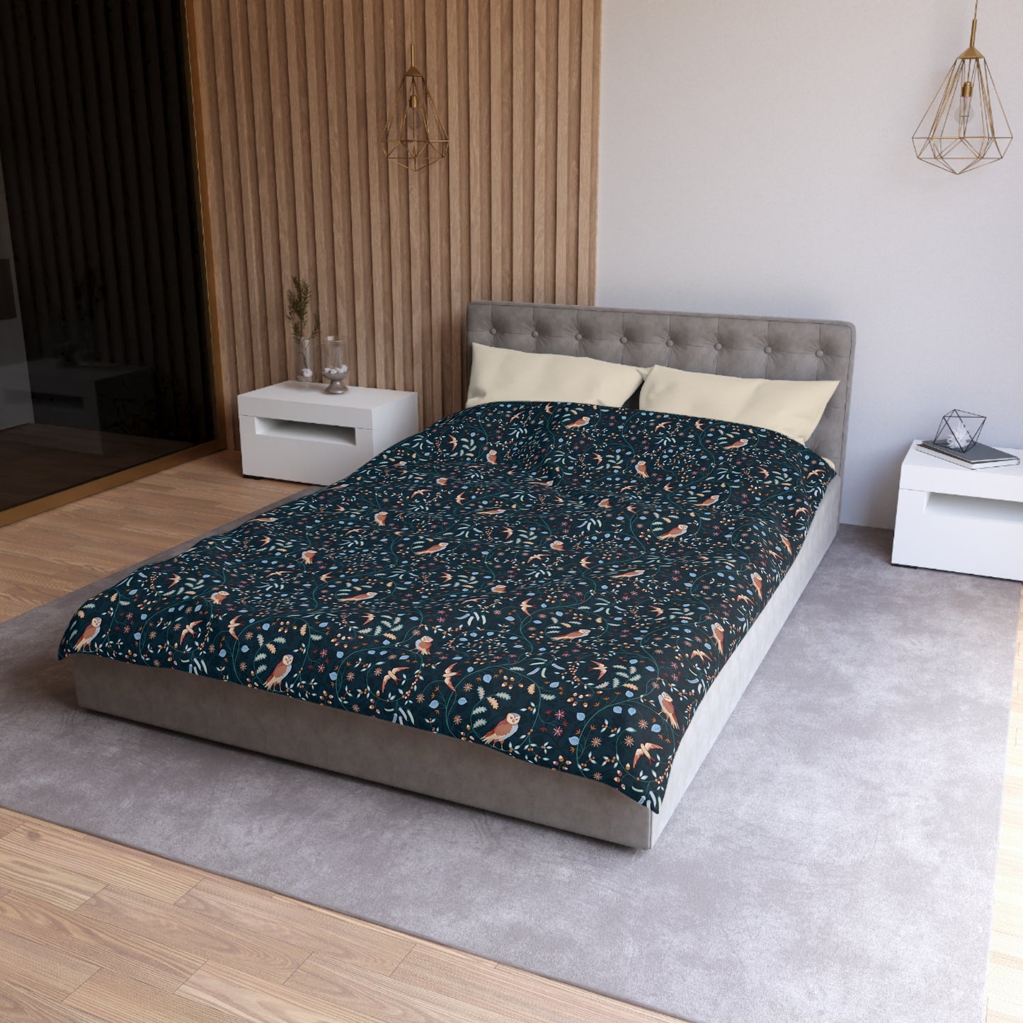 Bed with patterned bedding in a modern bedroom setting