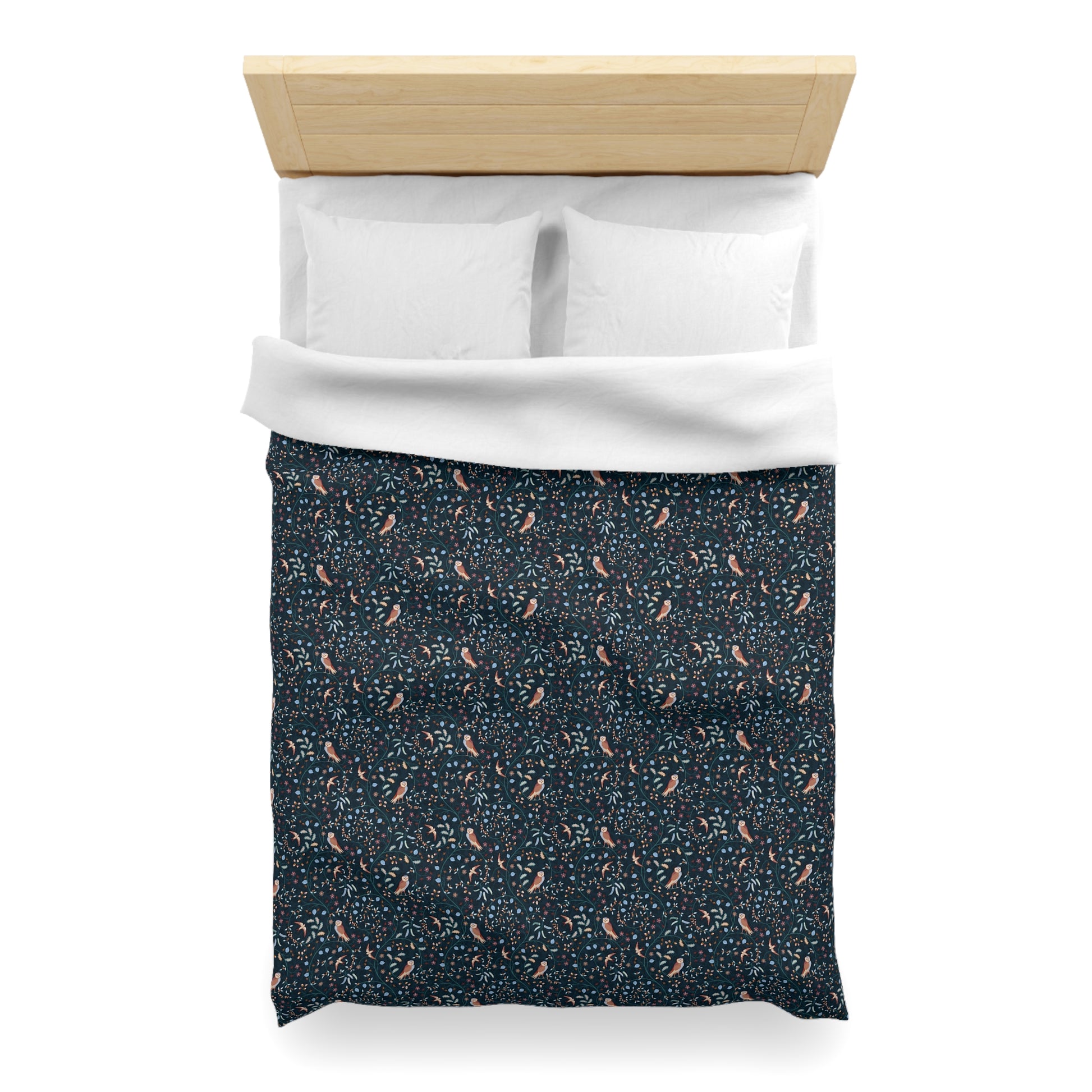 Patterned duvet cover with a white top section on a white background