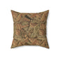 A square-shaped throw pillow with a brown faux suede cover featuring a leaf pattern inspired by William Morris - Acanthus Collection.