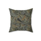 A square-shaped faux suede cushion with a William Morris & Co floral pattern in shades of grey, green, and beige.