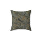 A square-shaped faux suede cushion with a William Morris & Co floral pattern in shades of grey, green, and beige.