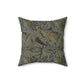 A square-shaped faux suede cushion with a William Morris & Co floral pattern in shades of grey, green, and beige.