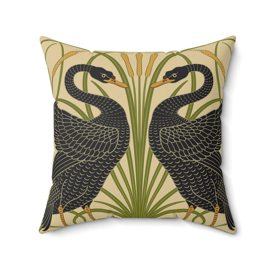 A square-shaped throw pillow with a double-sided print featuring black swans on a beige background with green leaf William Morris & Co patterns.