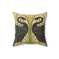 A square-shaped throw pillow with a double-sided print featuring black swans on a beige background with green leaf William Morris & Co patterns.