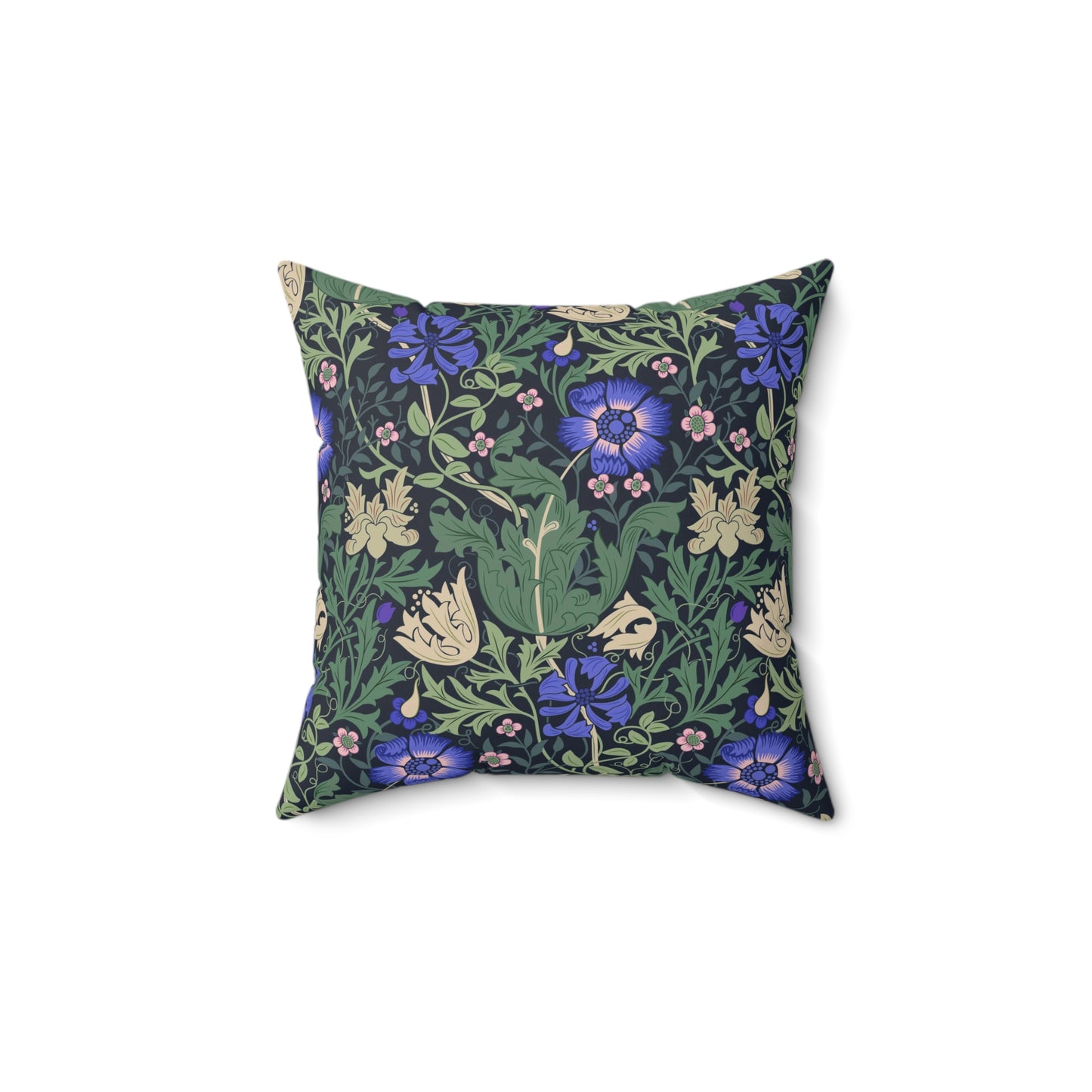 A square-shaped faux suede cushion with a floral William Morris & Co pattern featuring blue flowers and green leaves on a dark background called Compton.