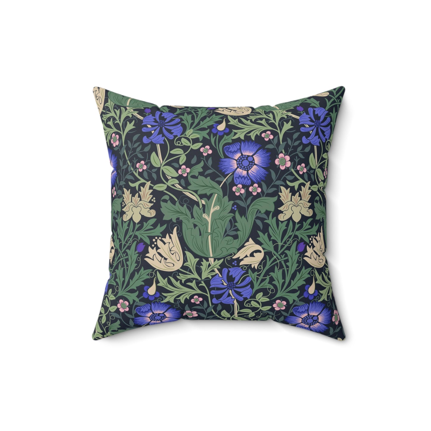 A square-shaped faux suede cushion with a floral William Morris & Co pattern featuring blue flowers and green leaves on a dark background called Compton.