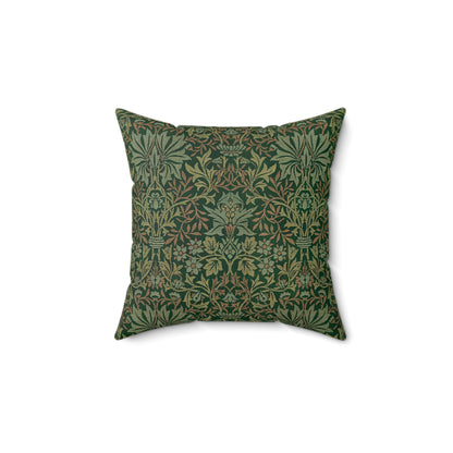 A square-shaped cushion with a floral William Morris & Co pattern in green faux suede fabric.